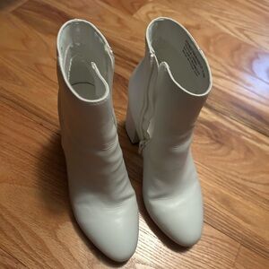 Stylish White Ankle Booties with Sleek Silhouette